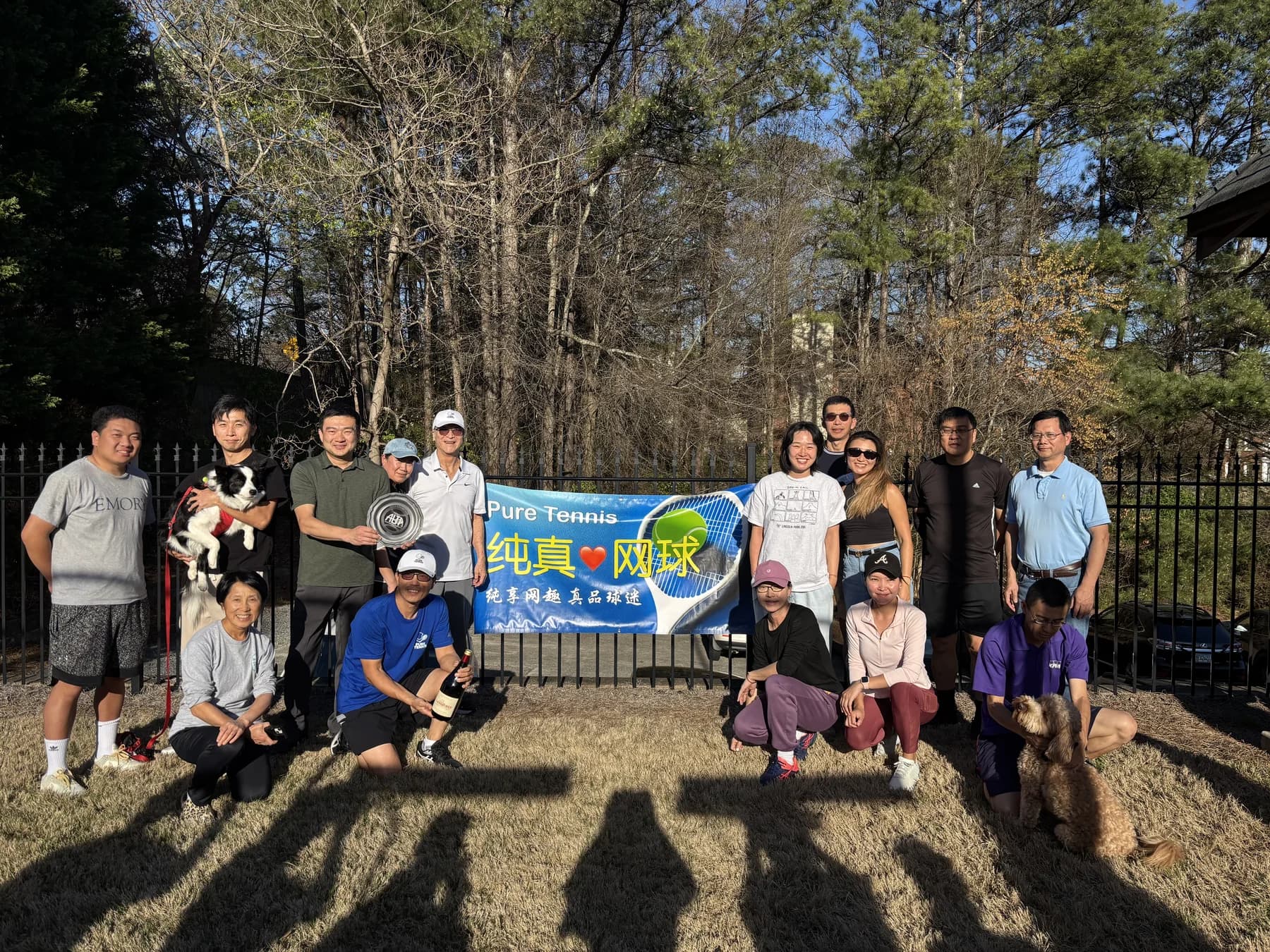 AARSA tennis community members posing together on the court
